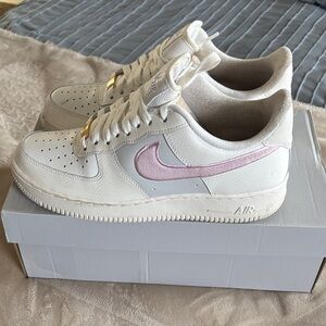 Nike White and Pink Sneakers with Gold Accents